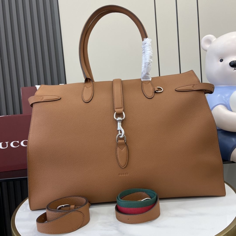 G*u*i shopping bags